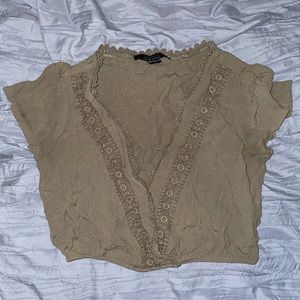 green cropped blouse